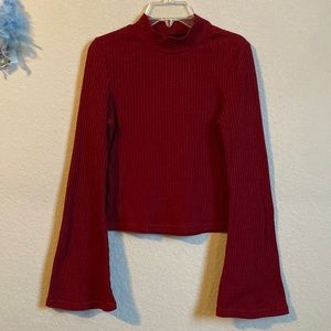 Long flared sleeved mock neck red shirt